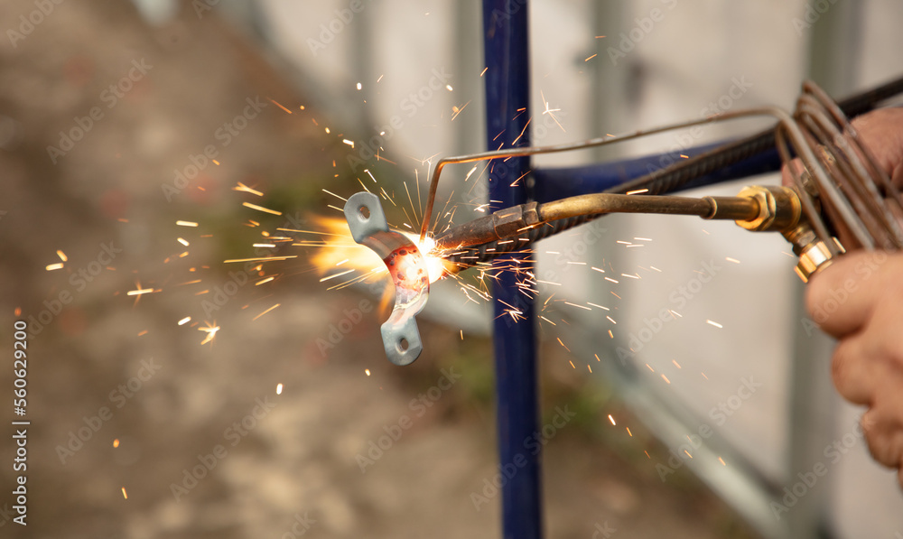 Gas welding of metal at the construction site. Gas welding of metal at the construction site.