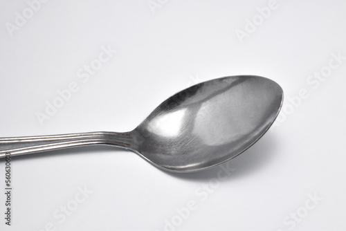 Steel spoon isolated on a white background