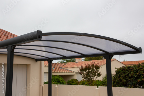 Fotografie Modern carport facility Polycarbonate front house garage building