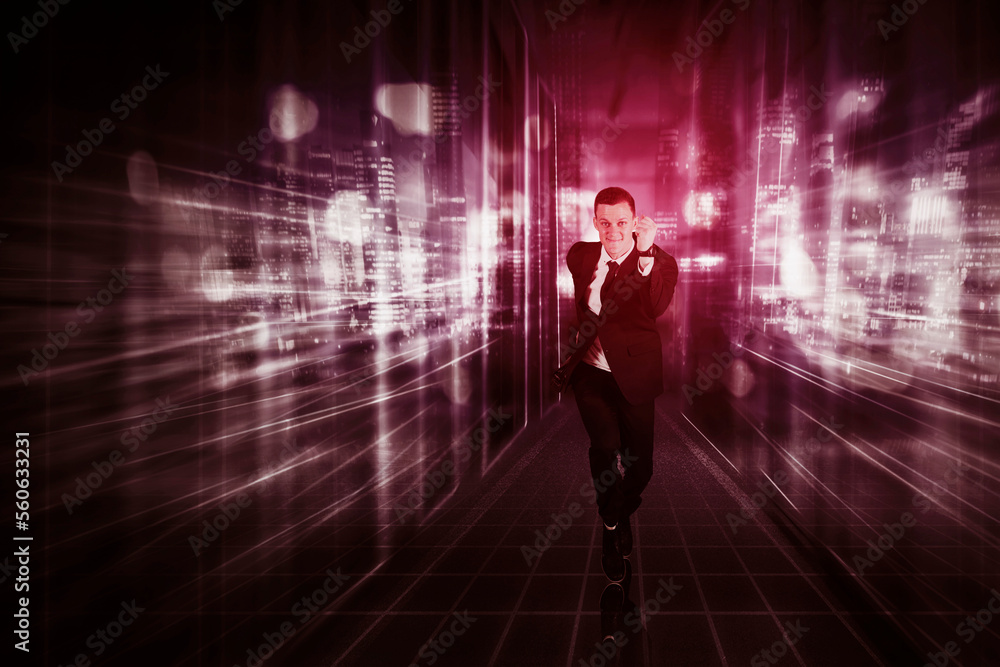 Young determined businessman running towards camera Young determined businessman running towards camera