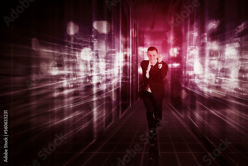 Young determined businessman running towards camera