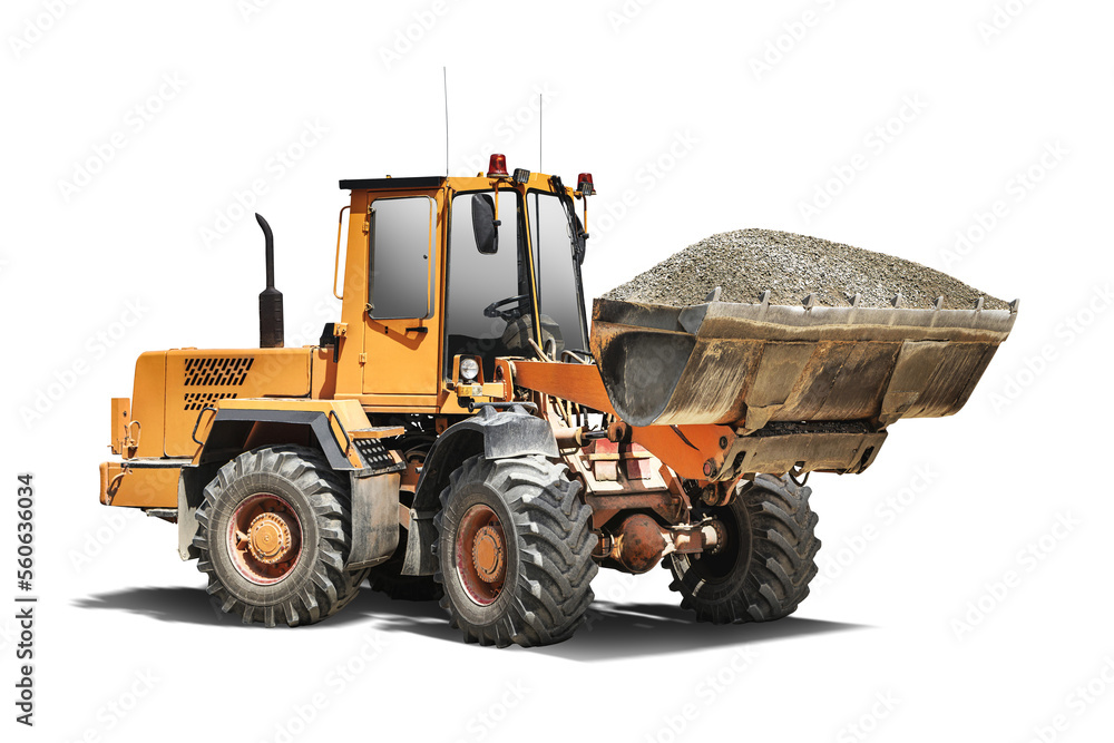 Heavy front loader or bulldozer on a white isolated background transports gravel in a bucket. construction machinery. Element for design. Transportation and movement of bulk materials.