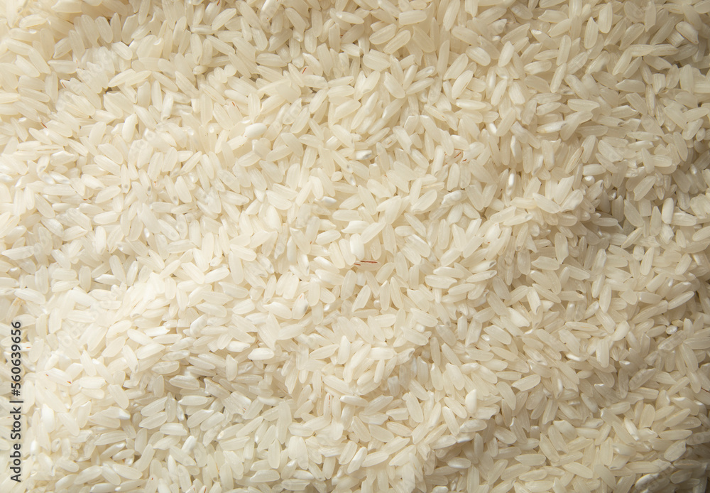 dry white rice closeup top view. raw uncooked white rice macro photo dry white rice closeup top view. raw uncooked white rice macro photo