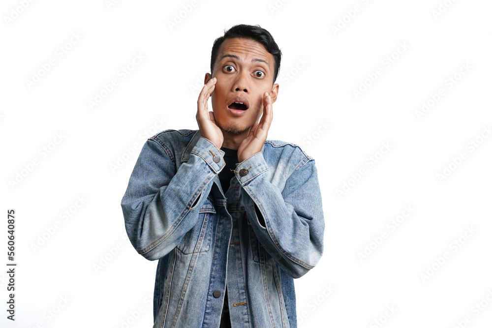 asian man wearing blue jean jacket with excited surprised gesture, isolated on white background asian man wearing blue jean jacket with excited surprised gesture, isolated on white background