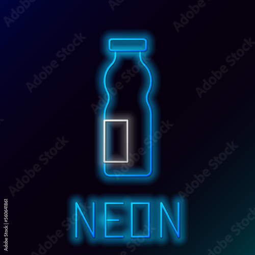 Glowing neon line Drinking yogurt in bottle icon isolated on black background. Colorful outline concept. Vector