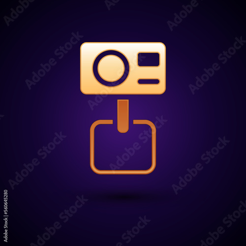 Gold Action extreme camera icon isolated on black background. Video camera equipment for filming extreme sports. Vector