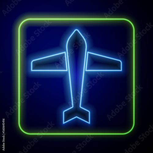 Glowing neon Jet fighter icon isolated on blue background. Military aircraft. Vector