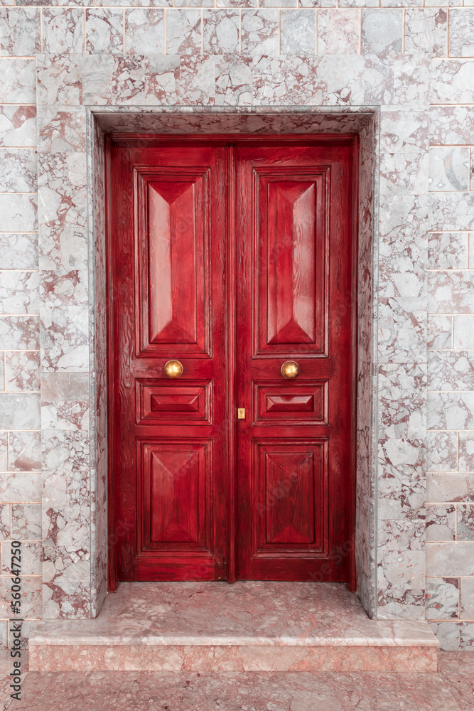 Old red double door in Hydra town, Greece. Old red double door in Hydra town, Greece.
