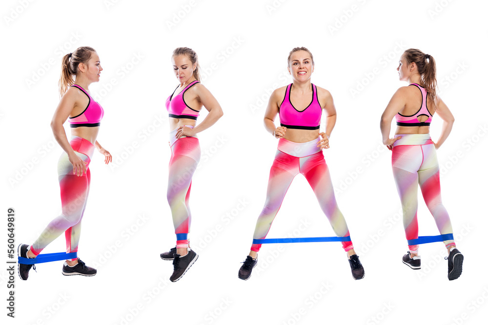 A young woman is doing leg exercises with an elastic band while standing. Smiling beauty woman in bright sportswear. Sport, activity and health. Isolated on white background. A young woman is doing leg exercises with an elastic band while standing. Smiling beauty woman in bright sportswear. Sport, activity and health. Isolated on white background.