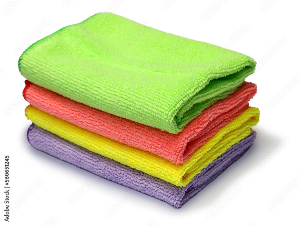 Stack of clean colorful microfiber cloths isolated on white background. Stack of clean colorful microfiber cloths isolated on white background.