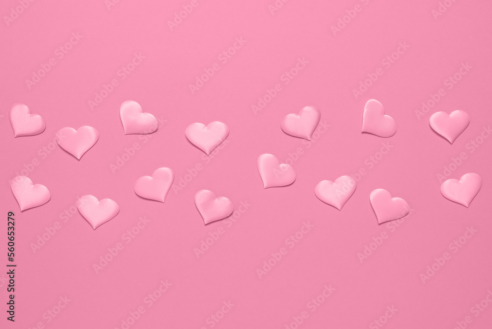 Pink hearts on a pink pastel background. Valentine's Day. Top view, flat lay, copy space.