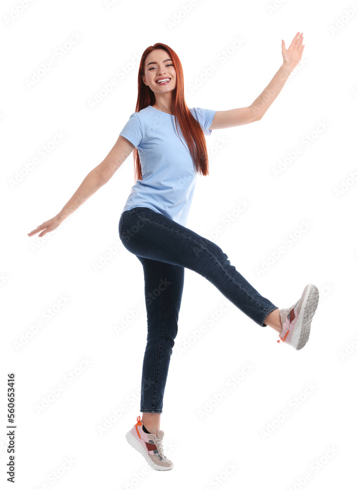 Happy woman with red dyed hair having fun on white background