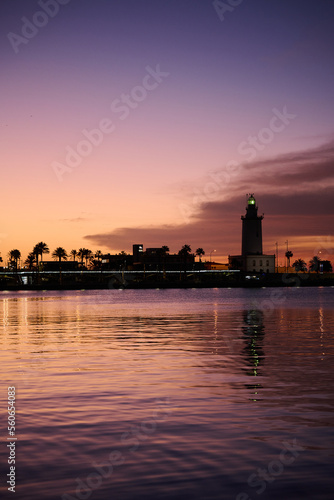 Lighthouse in Malaga at sunrise.