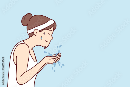 Woman with sports headband on hair holds water in palms wanting to wash face after fitness or morning jogging. Girl in T-shirt with drops of sweat on face after athletic exercises. Flat vector image 