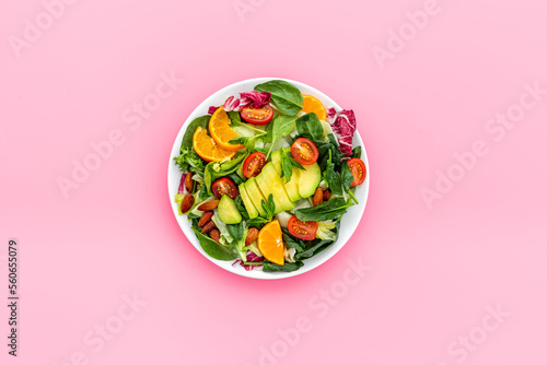 Vegan meal with healthy green salad - avocado and tomatoes in bowl © 9dreamstudio
