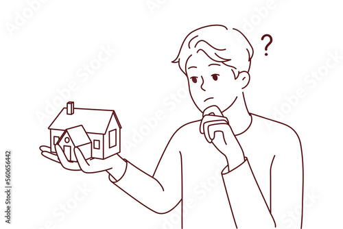 Young man holding house thinking of mortgage or loan. Confused male with home maquette frustrated with housing rent or purchase. Real estate agent. Vector illustration. 