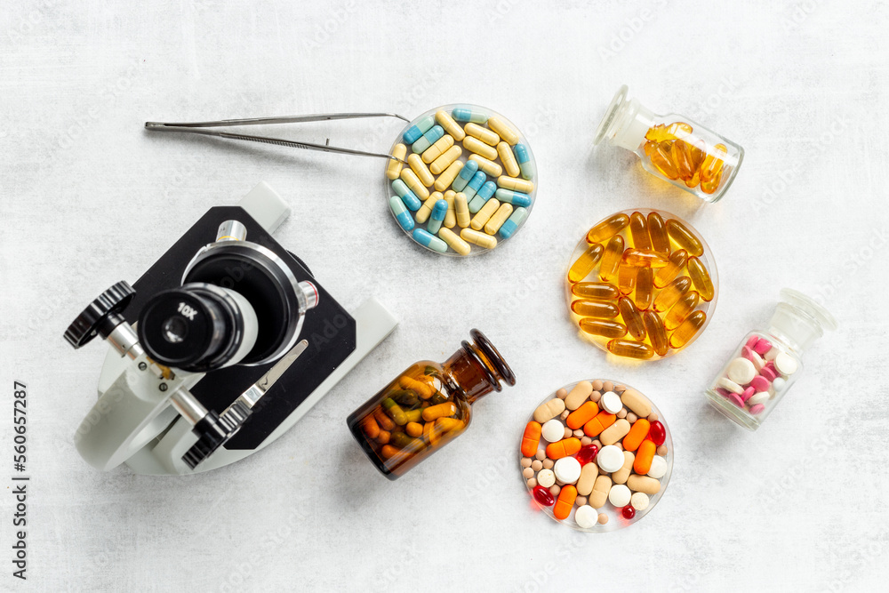 Medical drags quality research with microscope in microbialogical labaratory Medical drags quality research with microscope in microbialogical labaratory