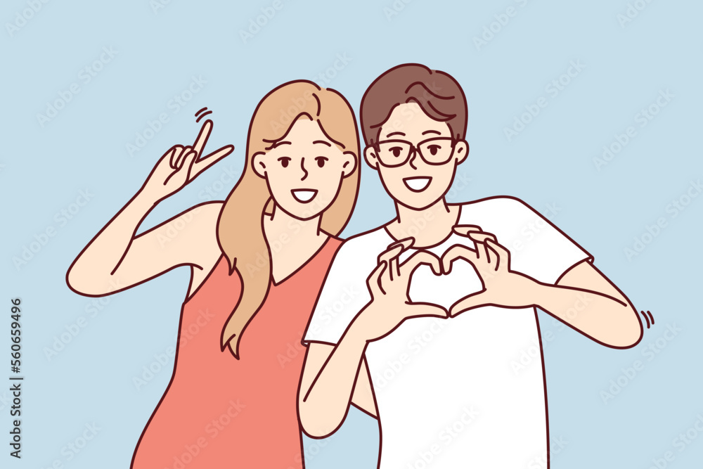Friendly young man and woman stand in embrace and smiling looking at camera. Guy and girl in casual clothes show different gestures while posing for friendly photo. Flat vector illustration Friendly young man and woman stand in embrace and smiling looking at camera. Guy and girl in casual clothes show different gestures while posing for friendly photo. Flat vector illustration