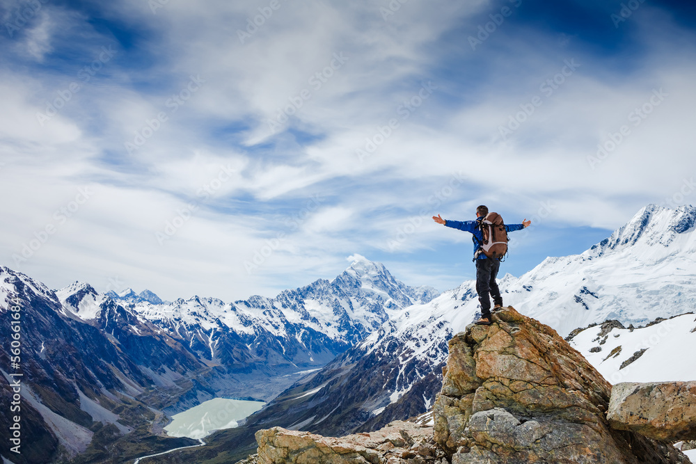 Mountain Lover travel in Alp. Wild nature on the background Mountain Lover travel in Alp. Wild nature on the background