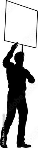 Protestor or demonstrator at a demonstration march, picket line or strike protest rally in silhouette. Holding up a banner or picket sign board placard.