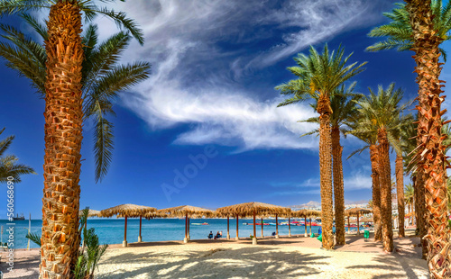 Relaxing  atmosphere on central public beach of Eilat - famous tourist resort...