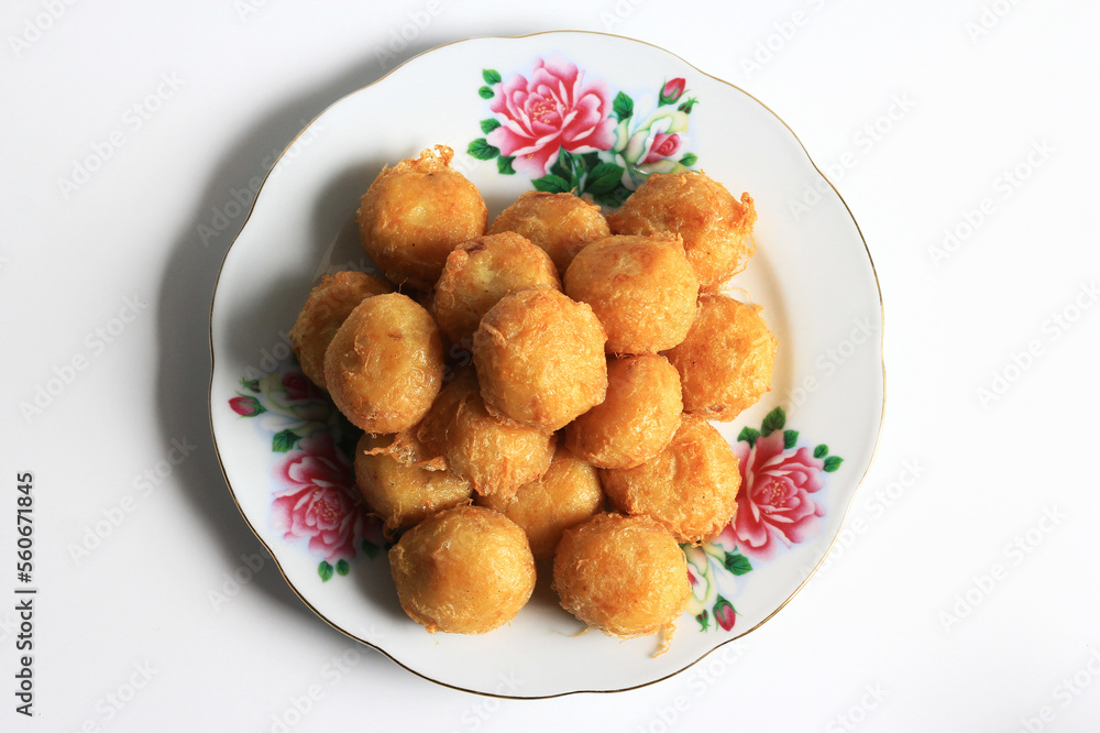 Indonesian food : Perkedel is fried patties, made of ground potatoes and minced meat and vegetables, isolated on white background. Indonesian food : Perkedel is fried patties, made of ground potatoes and minced meat and vegetables, isolated on white background.