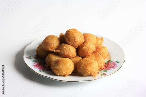 Indonesian food : Perkedel is fried patties, made of ground potatoes and minced meat and vegetables, isolated on white background.