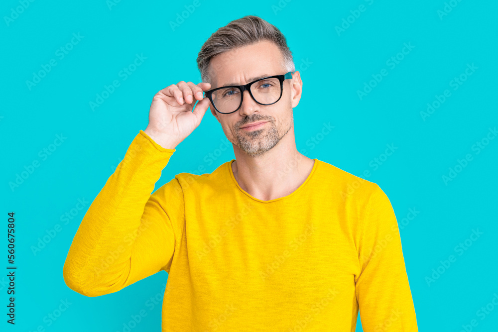 mature man look in eyewear on background. photo of man look in eyewear. mature man look in eyewear on background. photo of man look in eyewear.