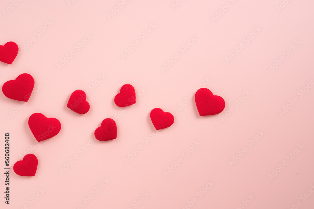 Valentine's Day design concept of red heart on pink background.