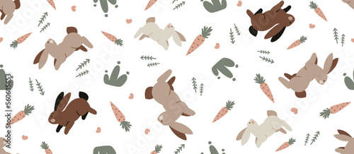 Seamless background, pattern with the image of rabbits and carrots. Baby vector illustration for textile isolated on white background