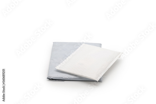 Isolated Postal Package from shopping online, is delivered to the buyer. It's shot in the studio light in front of white background. Clipping Paths.