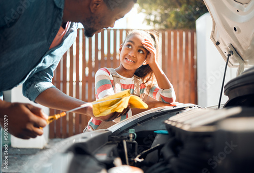 Konstfotografi Car problem, child and dad working as a mechanic while teaching daughter to change motor oil and fix vehicle
