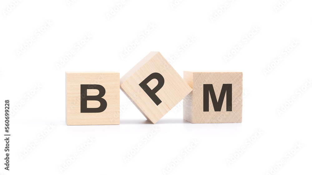 BPM - acronym from wooden blocks with letters, Business Process Management concept, top view on white background BPM - acronym from wooden blocks with letters, Business Process Management concept, top view on white background