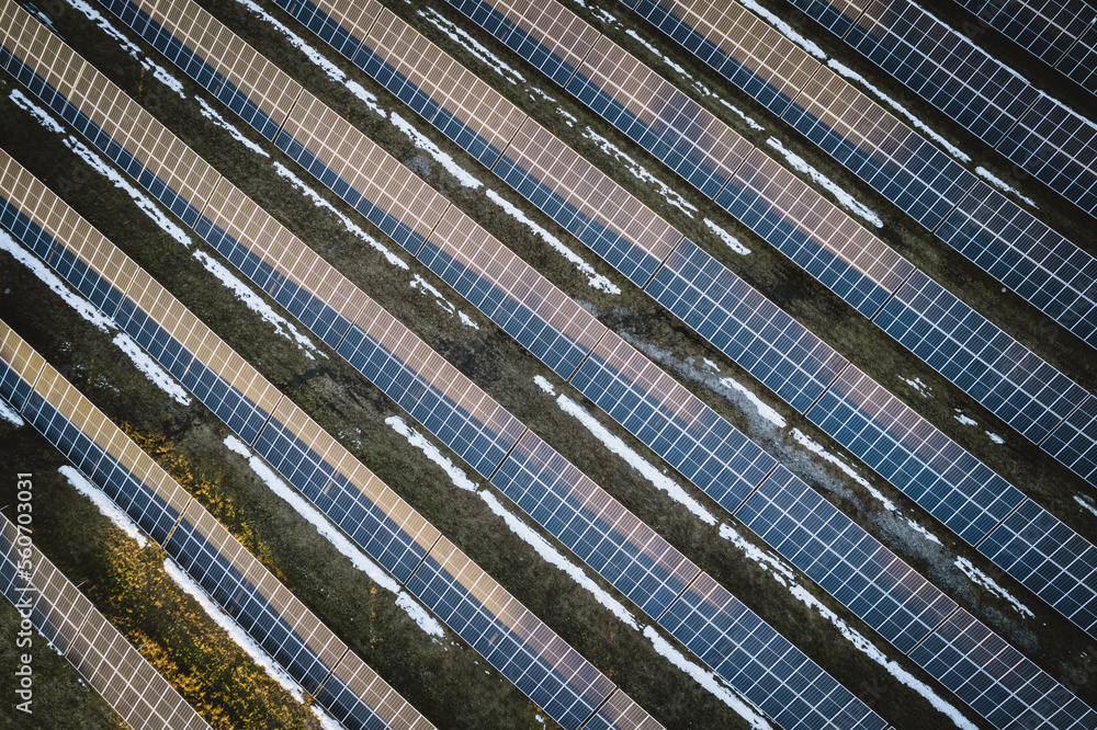 Aerial detail of solar panel farm generating renewable energy