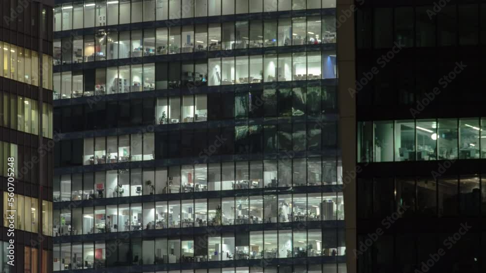 Close view to office windows in Skyscrapers International Business Center City at night timelapse from top Close view to office windows in Skyscrapers International Business Center City at night timelapse from top