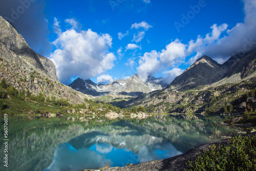 The mirror surface of the alpine lake Darashkol. Belukha National Park, Republic of Altai, Siberia, Russia.