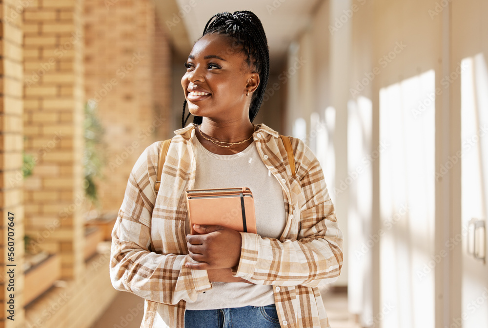 Black woman, college student and thinking about future with books while walking at campus or university. Young gen z female happy about education, learning and choice to study at school building - obrazy, fototapety, plakaty 