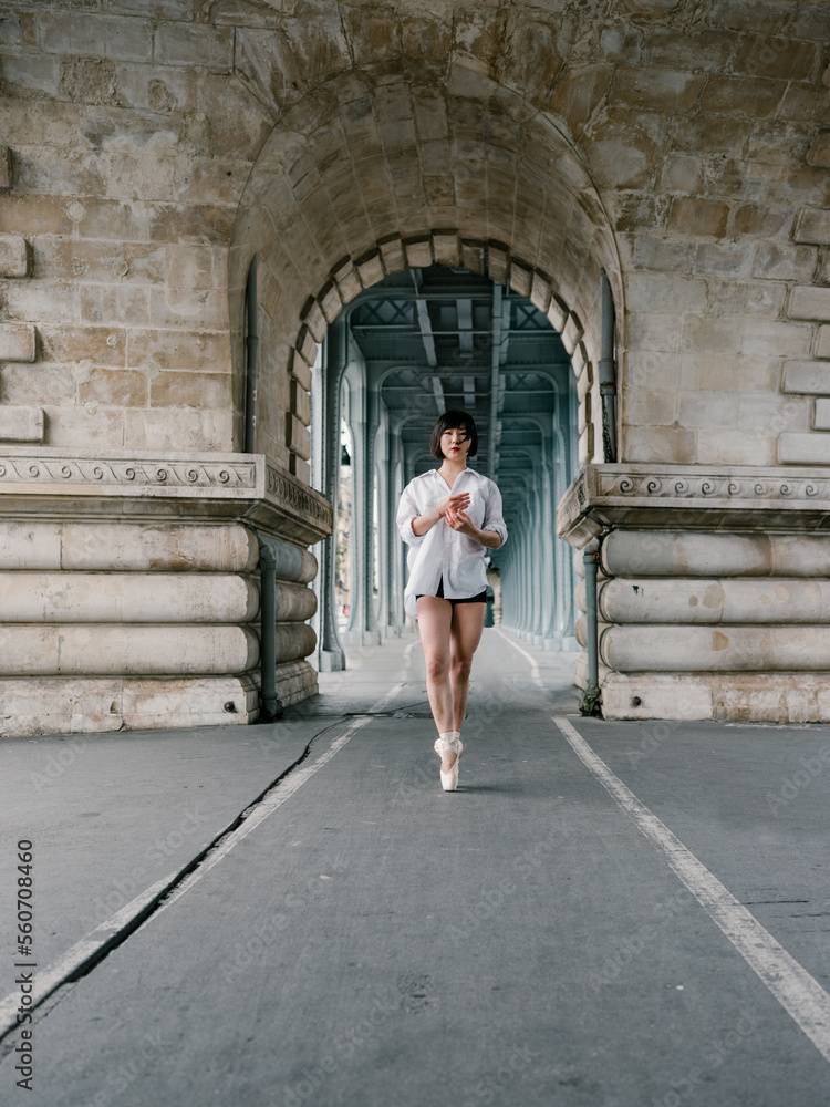 Ballet Dancer Making A Dancing Pose Outside Ballet Dancer Making A Dancing Pose Outside