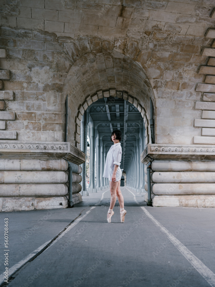 Ballet Dancer Making A Pose Of Ballet Outside Ballet Dancer Making A Pose Of Ballet Outside