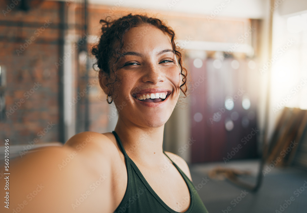 Fitness portrait, exercise and gym selfie of a woman happy about workout, training motivation and body wellness. Young sports female or athlete with a smile on social media blog for healthy lifestyle