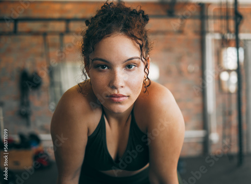 Fényképezés Fitness, exercise and portrait of a woman at gym for a workout and training for healthy lifestyle and body wellness