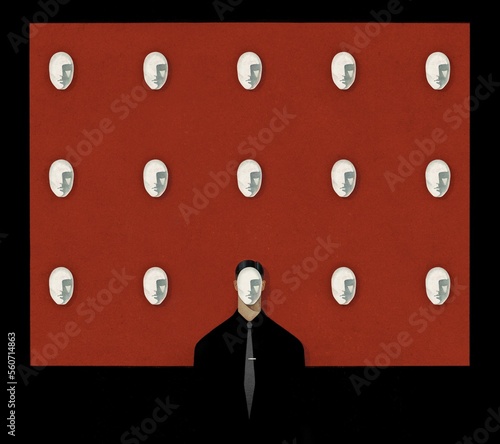 Man hides his face under one of his masks