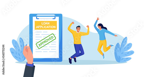 Credit agent holds loan approval application document with approved stamp in hand . People borrow money from bank to buy real estate or auto. Mortgage, debt or obligation to pay back interest rate