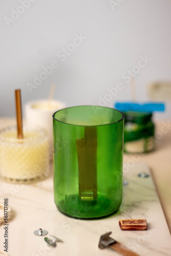 A green glass from a wine bottle for a candle. wooden wick