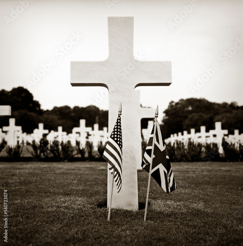 WWII grave marker with American and United Kingdom flags. photo