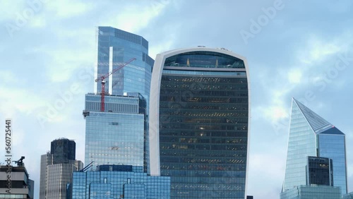 London Skyscrapers Against Cloudy Sky. Iconic Buildings Fenchurch (The Walkie-Talkie) And The Scalpel In View. static photo