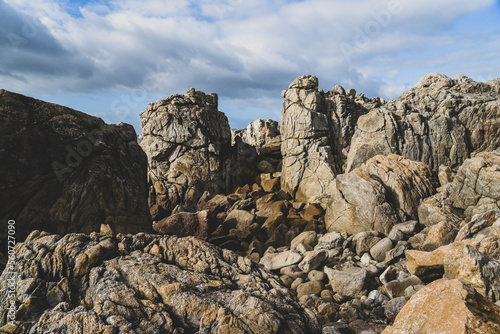 Beautiful and wild rocky coast of France in vintage retro tones, vintage landscape of coastline of France..