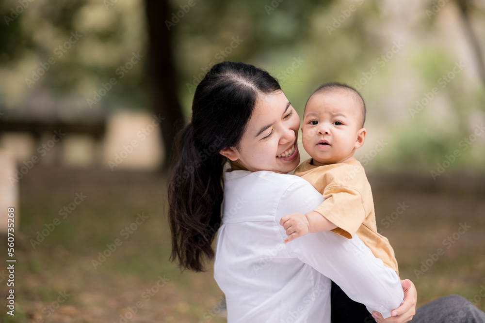 Portrait of asian mother playing with newborn baby Portrait of asian mother playing with newborn baby