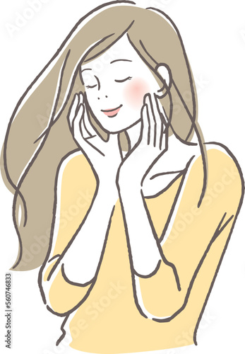 頬に手を当て微笑む女性