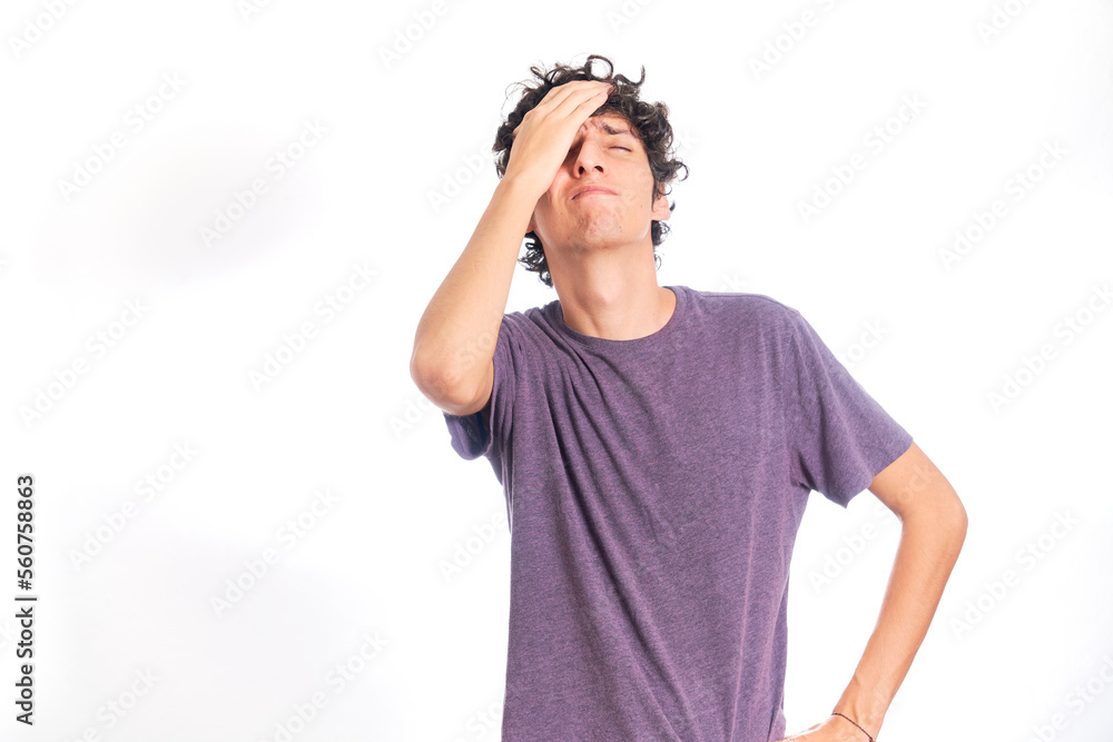 Young Hispanic man with fed up gesture. Isolated on white background. Young Hispanic man with fed up gesture. Isolated on white background.